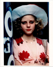Jodie Foster as Iris wearing hat stands in doorway Taxi Driver 8x10 inch photo