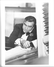 Sean Connery as James Bond in tuxedo aiming gun 8x10 photo