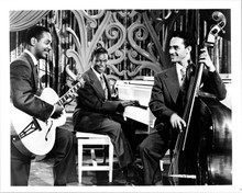 Nat King Cole playing his piano with his band 8x10 inch photo