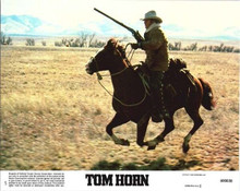 Tom Horn 8x10 photo Steve McQueen rides horse holding rifle