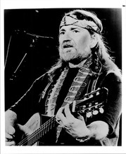 Willie Nelson in black t-shirt playing guitar 1980's era 8x10 inch photo