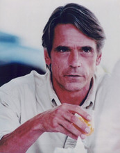 Jeremy Irons in white shirt holding glass of orange juice 8x10 photo