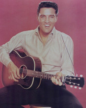 Elvis Presley smiles in silk shirt holding guitar 8x10 inch photo