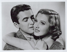 James Stewart and Jean Arthur smile and embrace 8x10 inch photo