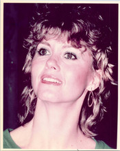 Olivia Newton John 1980's era smiling at press cameras 8x10 inch photo