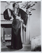 Myrna Loy 1930's era in robe by fireplace 8x10 inch photo