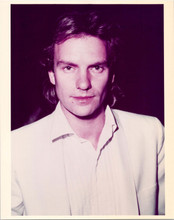Sting young pose in white suit at press call 8x10 inch photo