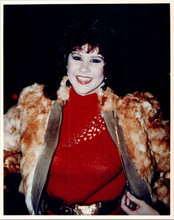 Linda Blair smiles for cameras in fur trimmed jacket 1980's 8x10 press photo