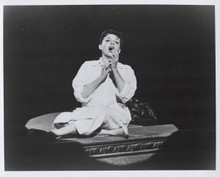 A Star is Born 1954 8x10 inch photo Judy Garland sits on edge of stage singing