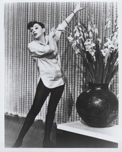 A Star is Born 1954 8x10 inch photo Judy Garland full body pose next to flowers