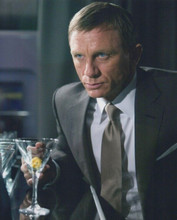 Daniel Craig in suit as James Bond with martini glass 8x10 inch photo