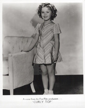 Shirley Temple smiling pose by chair 1935 Curly Top 8x10 inch photo