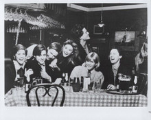 St. Elmo's Fire cast pose gathered around restaurant table 8x10 inch photo