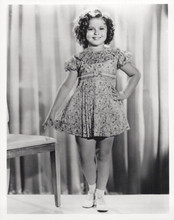 Shirley Temple smiling pose showing off her dress 8x10 inch photo
