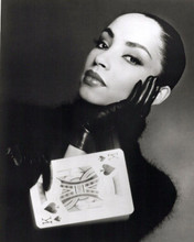 Sade Smooth operator holds pack of cards 8x10 inch photo