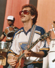 Carlos Santana 1970's era on stage playing guitar wearing shades 8x10 photo