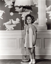 Shirley Temple smiles posing by floor lamp Our Little Girl movie 8x10 photo