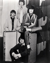 The Beatles The Fab Four pose with large luggage trunk 8x10 inch photo