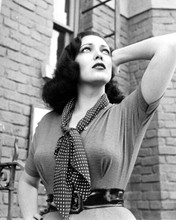 Linda Darnell striking pose in figure hugging shirt & scarf 8x10 inch photo