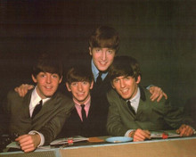 The Beatles 1964 the boys sitting at table smiling for the press 8x10 photo