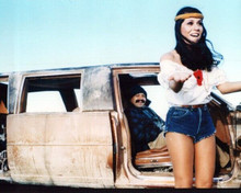 Evelyn Guerrero stands in blue shorts Cheech Marin sits in car 8x10 photo