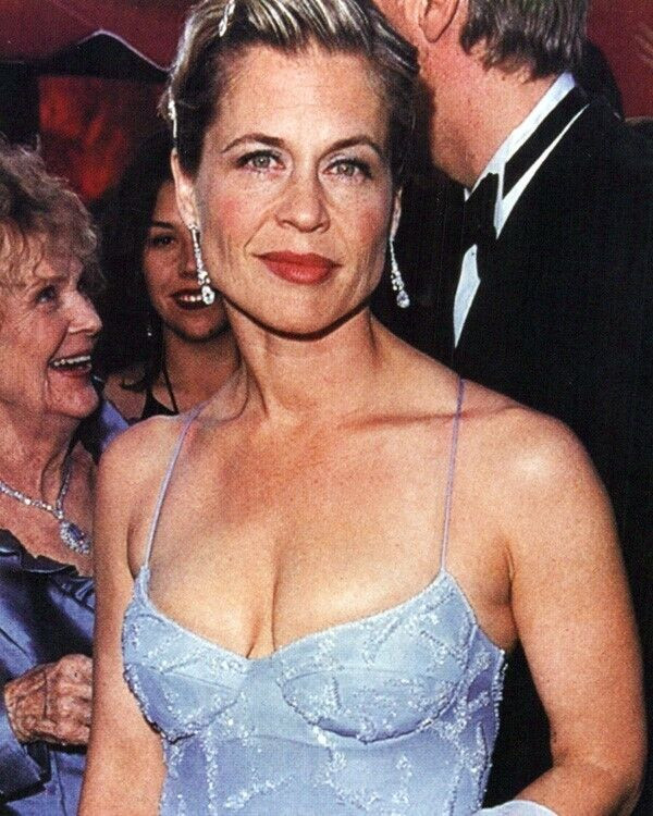 Linda Hamilton 8x10 inch photo in low cut blue dress & diamond earrings -  The Movie Store