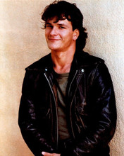 Patrick Swayze smiling young portrait in black leather jacket 8x10 inch photo