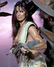 Caroline Munro wielding spear as Dia 1976 At The Earth's Core 8x10 inch photo