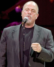 Billy Joel contemporary in black outfit standing by microphone 8x10 inch photo
