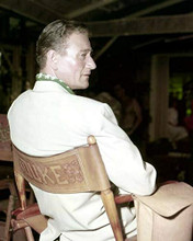 John Wayne The Duke sitting in his movie chair on set 1950's 8X10 inch photo