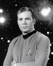 William Shatner as Kirk against star backdrop Star Trek 8x10 inch photo