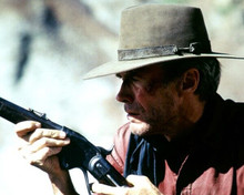 Clint Eastwood takes aim with rifle The Unforgiven 8x10 inch photo