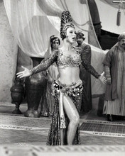 Juliette Prowse in exotic outfit with bare midriff dancing 8x10 inch photo