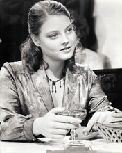 Jodie Foster sits with glass of champagne circa 1980's 8x10 inch photo