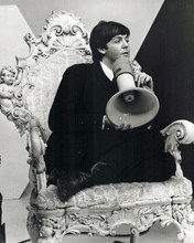 Paul McCartney sits in chair holding megaphone A Hard Day's Night 8x10 photo