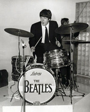 Paul McCartney 1960's sitting at The Beatles drum set 8x10 inch photo