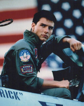 Tom Cruise vintage 8x10 inch photo seated in jet by American flag Top Gun iconic