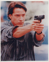 Keanu Reeves vintage 8x10 inch photo pointing gun Point Break