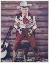 Roy Rogers in western outfit holding guns in both hands vintage 8x10 inch photo