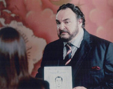 John Rhys Davies holds up identikit vintage 8x10 inch photo