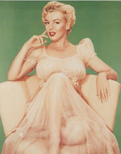 Marilyn Monroe vintage 8x10 inch photo seated on chair in sheer white gown