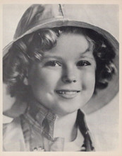 Shirley Temple vintage 8x10 inch photo on fiber paper in fireman's helmet