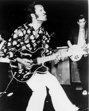 Chuck Berry playing guitar doing his famous duck walk 8x10 inch photo
