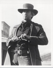 Clinnt Eastwood loads his handgun Pale Rider 8x10 inch photo