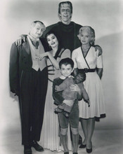The Munsters 8x10 inch photo Herman poses with his family full body pose