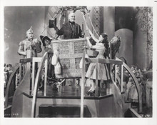 Wizard of Oz Judy Garland Lion Tin Man Scarecrow hold onto balloon 8x10 photo