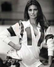 Raquel Welch poses in Kansas City Bomber jersey shows cleavage 8x10 inch photo
