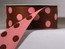 1-1/2 inch reverse dots in dark chocolate with raspberry cream