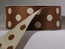 1-1/2 inch reverse dots in chocolate with coffee cream