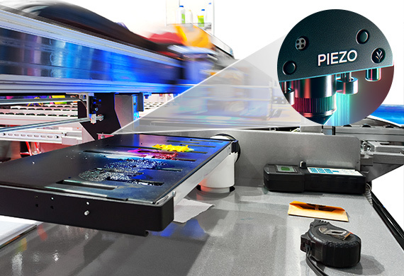 Piezo print head technology for ink placement in UV printing